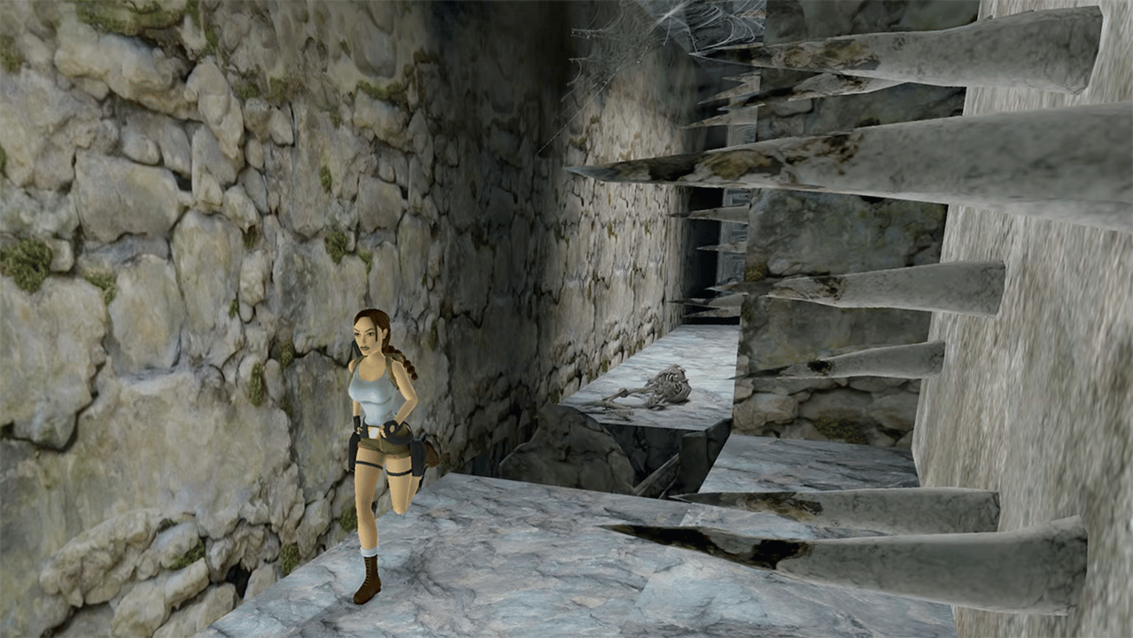 Gameplay screenshot showing Lara Croft navigating a trap corridor in Tomb Raider I-III Remastered