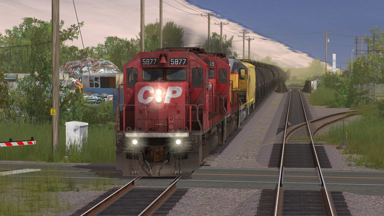 Trainz Plus: CP SD40-2 #5865-5879 Dual Flags Image